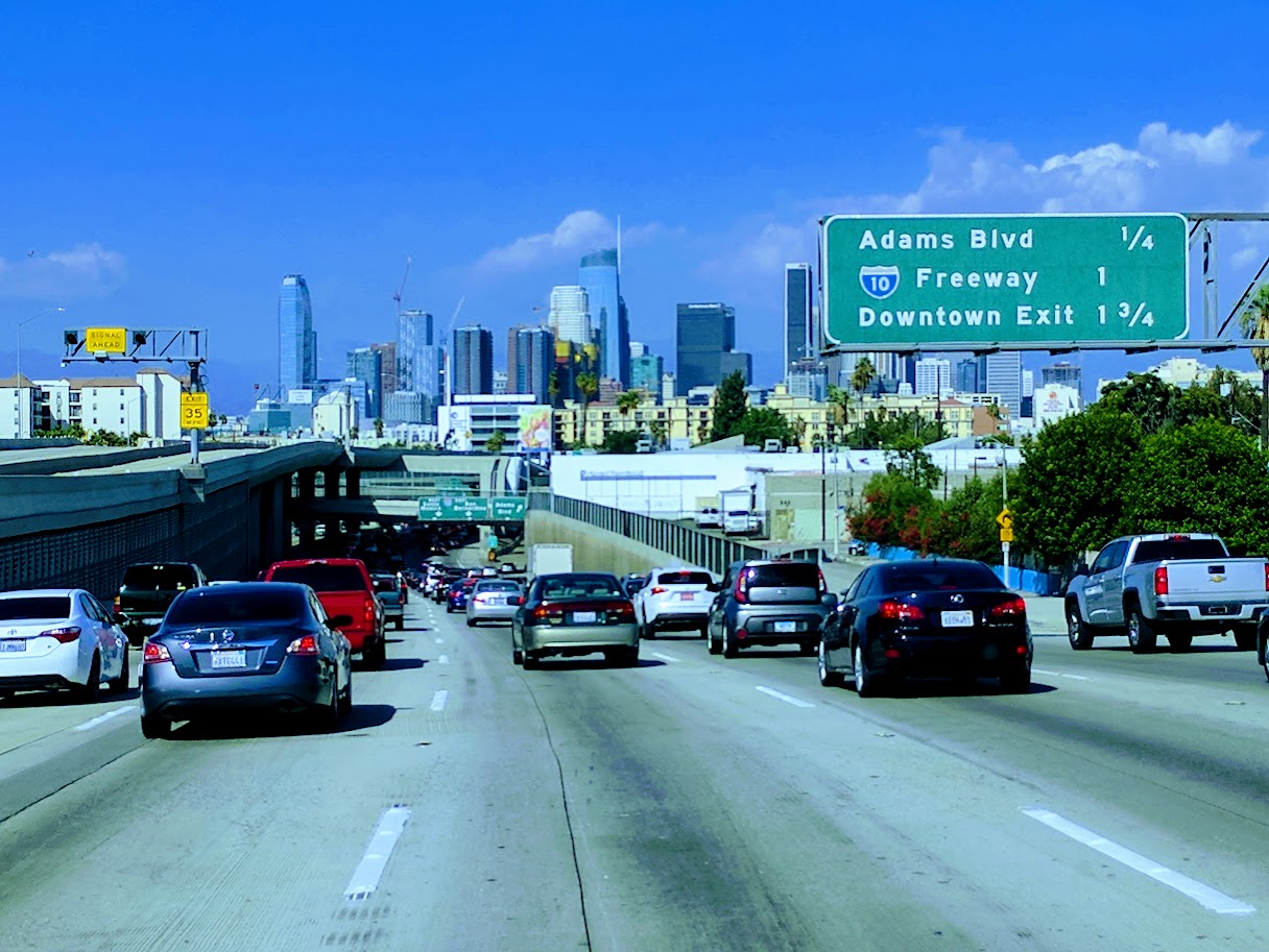 Downtown Los Angeles skyline viewed along highway route
